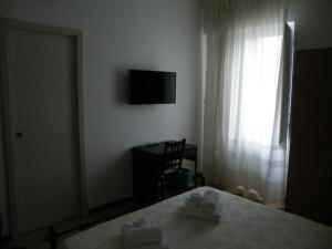 TV a/nebo společenská místnost v ubytování Casa NILLA