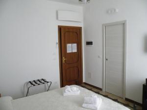 Postel nebo postele na pokoji v ubytování Casa NILLA