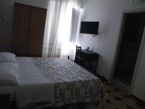 Postel nebo postele na pokoji v ubytování Casa NILLA