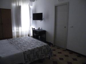 Postel nebo postele na pokoji v ubytování Casa NILLA