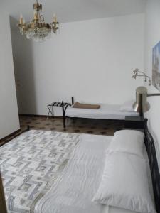 Postel nebo postele na pokoji v ubytování Casa NILLA