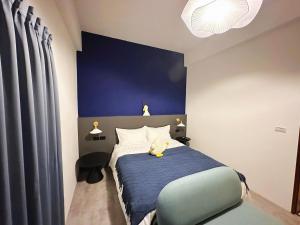 Postel nebo postele na pokoji v ubytování Hebron Inn
