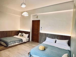 Postel nebo postele na pokoji v ubytování Hebron Inn