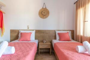Postel nebo postele na pokoji v ubytování Stelios Apartment