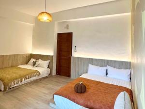 Postel nebo postele na pokoji v ubytování Hebron Inn