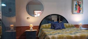 Posteľ alebo postele v izbe v ubytovaní B&B Meladormo