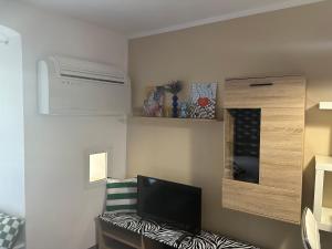 TV a/nebo společenská místnost v ubytování FEEL - Vivid Apartment