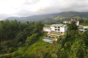 an aerial view of a house on a hill at Sky Lodge in Kandy