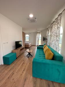 TV a/nebo společenská místnost v ubytování Apartmani BMD