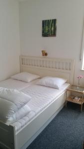 Postelja oz. postelje v sobi nastanitve Appartement Fichtenweg 43-4