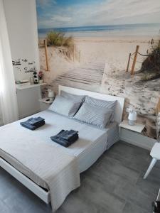 Postel nebo postele na pokoji v ubytování b&b Casa Balai 72 a 100 mt dal mare