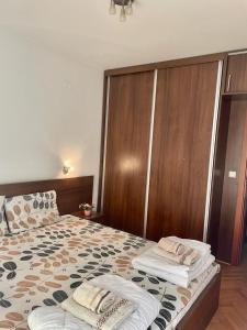 Una cama o camas en una habitación de Apartman Marija