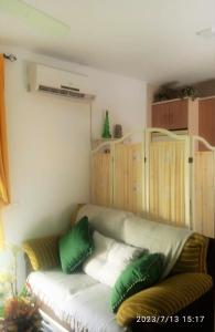 A bed or beds in a room at Ático Roquetas