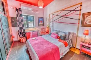 Postel nebo postele na pokoji v ubytování Casa dei colori