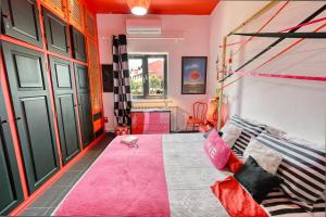 Postel nebo postele na pokoji v ubytování Casa dei colori