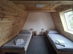 Postel nebo postele na pokoji v ubytování Wellness Hotel Koliba