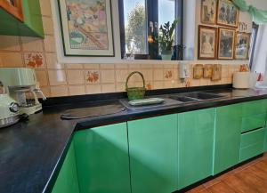 Kuchyň nebo kuchyňský kout v ubytování Casa dei colori