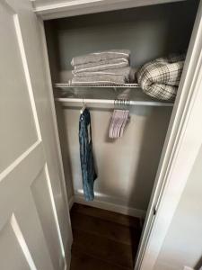 a closet with some towels and a towel at 1BR/BA Condo w/Patio - 8 min to Wildwood Beach/Boardwalk in Wildwood