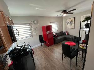 a living room with a couch and a table at 1BR/BA Condo w/Patio - 8 min to Wildwood Beach/Boardwalk in Wildwood