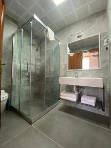 Koupelna v ubytování Ulivo Hotel + 37 fotografií