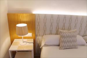 A bed or beds in a room at Sóller Center