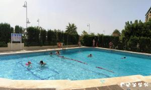 The swimming pool at or close to TAO 1 Primera línea de Playa VELILLA