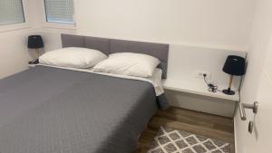 Postel nebo postele na pokoji v ubytování Luxury Villa Jasna 2