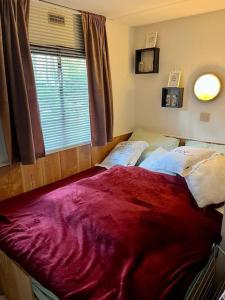Photo de la galerie de l'établissement Sfeervol chalet in het bos, à Nunspeet 17 autres photos