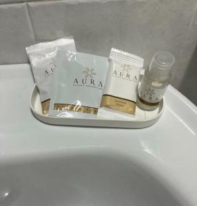 a tray on top of a toilet in a bathroom at Appartamento nel cuore di Campo Imperatore in Castel del Monte