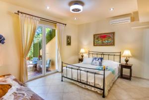 Postel nebo postele na pokoji v ubytování Lefkas Blue Residence + 37 fotografií