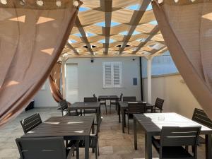 Restaurace v ubytování Perla D'Oriente - Affittacamere