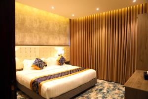Letto o letti in una camera di Oriens Hotel