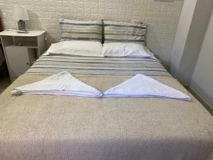 Ліжко або ліжка в номері POSADA DON CANDIDO