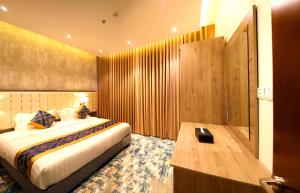 Letto o letti in una camera di Oriens Hotel