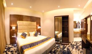 Letto o letti in una camera di Oriens Hotel