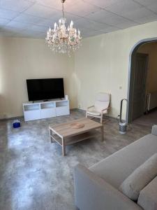 Μια τηλεόραση ή/και κέντρο ψυχαγωγίας στο Appartement à Bruxelles Midi - Grand place Bruxelles