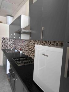 Η κουζίνα ή μικρή κουζίνα στο Appartement à Bruxelles Midi - Grand place Bruxelles