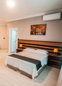 a bedroom with a large bed in a room at MiLAROOM in Edirne