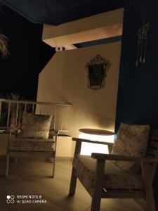 A seating area at TAO 1 Primera línea de Playa VELILLA