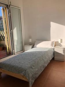 Cama o camas de una habitación en Ático en Gràcia