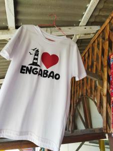 a white shirt with a red heart and the words emega at MARIBAO in Playas