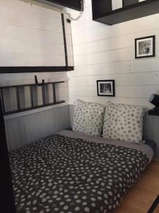 Ένα ή περισσότερα κρεβάτια σε δωμάτιο στο le studio