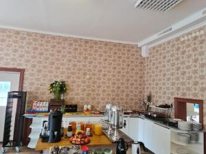 Kuchyň nebo kuchyňský kout v ubytování Appelberg hotel