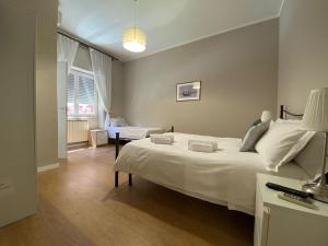 A bed or beds in a room at Key-Rome Re di Roma
