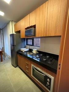 Villa Sapê 13的厨房或小厨房