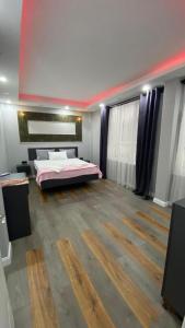 a bedroom with a bed in a room at BORDO SUİTE HOTEL in Trabzon