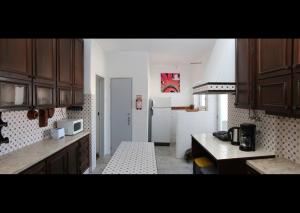 Η κουζίνα ή μικρή κουζίνα στο Peniche Housing | Tree The Company +20 φωτογραφίες