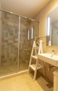 a bathroom with a shower and a sink at Urban Suite Zlatibor in Zlatibor