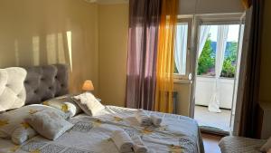 Posteľ alebo postele v izbe v ubytovaní Apartments Anica