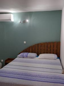 Postel nebo postele na pokoji v ubytování la casa mangue